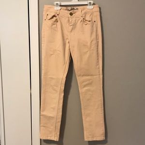 Light pink skinny jeans